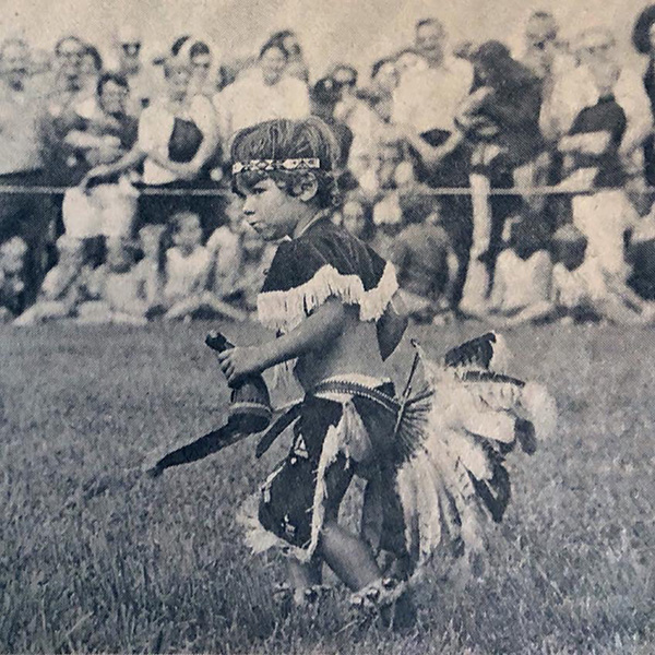 Toddler David Dominic Jr dancing in Native American regalia