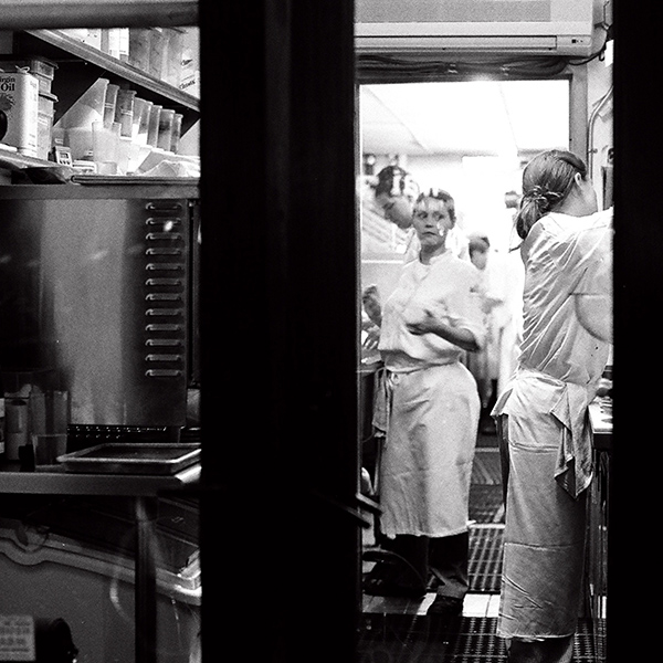 Street view of New York City cooks in a restaurant